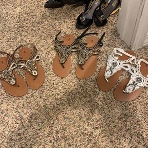 Three pairs of sparkly sandals